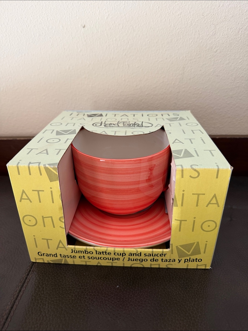 Invitations Hand Painted Jumbo Latte Cup & Saucer Set in an Orange Swirl Design
